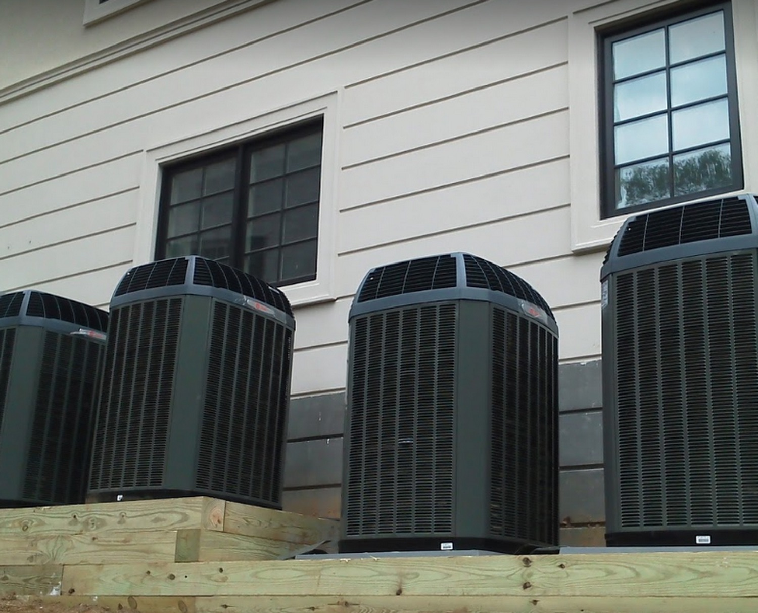 Twin high-efficiency condenser units installed by Zagros on a Northern Virginia home